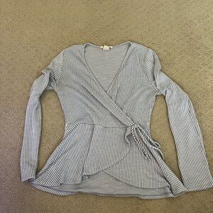 Blue long sleeve v-neck wrap blouse with ribbed texture